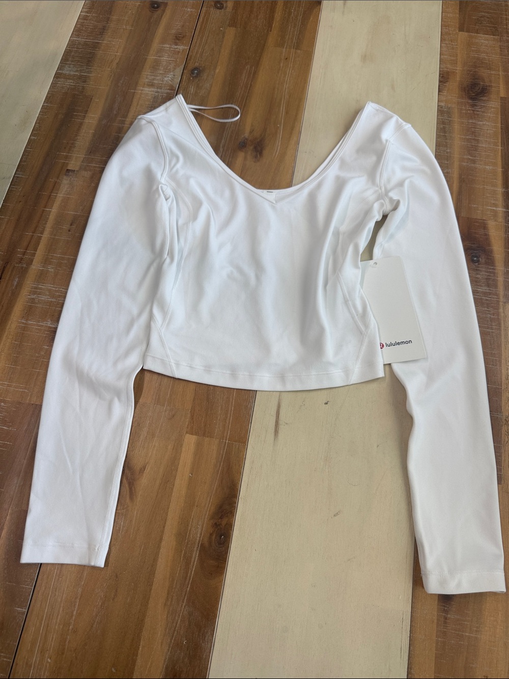 lululemon athletica White V‑Neck Long Sleeve Crop Top
